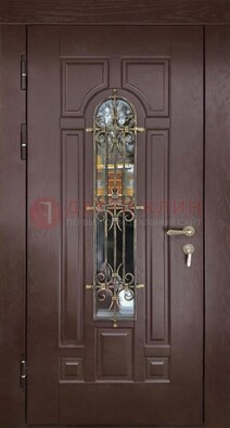 Темная железная дверь со стеклом и ковкой для частного дома ДСК-156 в Петрозаводске