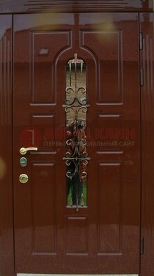Красивая металлическая дверь со стеклом и ковкой ДСК-33 в Петрозаводске